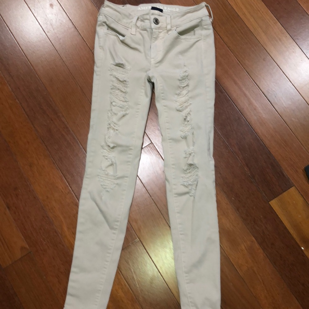 Cream American Eagle ripped  jeans